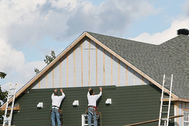 Professional Storm Damage Siding Repair technician working in Valdese, NC
